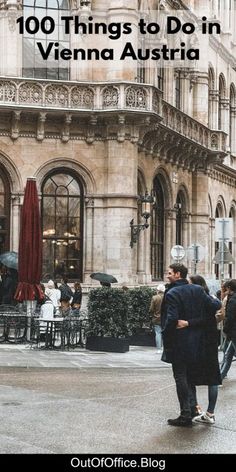 people walking down the street in front of an old building with text overlay that reads, 100 things to do in vienna austria