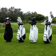 three different types of golf bags on the grass