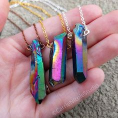 Rainbow Aura Quartz Crystal Necklace / Raw Crystal Necklace / Titanium Aura Quartz / Rainbow Crystal Jewellery / Rainbow Jewelry / PrideThese colorful crystal pendants are handmade with titanium rainbow aura quartz crystals and high-quality tarnish-resistant silver plated, 18k gold plated, or antique copper wire and chain.  Each quartz crystal is unique, with varying color, shimmer, and size, but maintains the same simple wire wrap design.  This design is inspired by dazzling rainbows in the sky Iridescent Pendant Crystal Necklace For Healing, Iridescent Crystal Necklaces For Healing, Iridescent Gemstone Pendant Crystal Necklace, Handmade Iridescent Crystal Necklace In Mystical Style, Iridescent Crystal Pendant For Jewelry Making, Iridescent Crystal Pendant Necklace For Jewelry Making, Iridescent Handmade Crystal Necklace, Rainbows In The Sky, Simple Wire Wrap