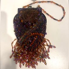 Chicos Cantata Beaded Bag Multi Stones Mini Bag Super Charming Nwt Bohemian Evening Bags With Beaded Fringe, Bohemian Evening Bag With Beaded Fringe, Elegant Beaded Bags For Festival, Brown Beaded Shoulder Bag For Everyday Use, Beaded Brown Bags As Fashion Accessory, Bohemian Beaded Rectangular Evening Bag, Purple Beaded Shoulder Bag For Everyday Use, Evening Brown Beaded Shoulder Bag, Multicolor Beaded Pouch Evening Bag