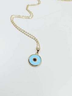 ⭐️Evil Eye bead is light blue, gold color and stainless steel. ⭐️Evil Eye Necklace is adjustable. ⭐️Lenght of the evil eye charm necklace is 60cm( 24 in ) ⭐️Widht of the evil eye pendant is 2 cm(0.78 in) ⭐️This Turkish evil eye jewelry would be the perfect gift for someone special. For more evil eye necklaces, click the link below; https://www.etsy.com/shop/EyeDesignsbyGG?ref=search_shop_redirect&section_id=30285329 Eye Gift, Turkish Evil Eye, Blue Evil Eye, Evil Eye Pendant, Evil Eye Charm, Evil Eye Necklace, Eye Necklace, Evil Eye Jewelry, Eye Jewelry