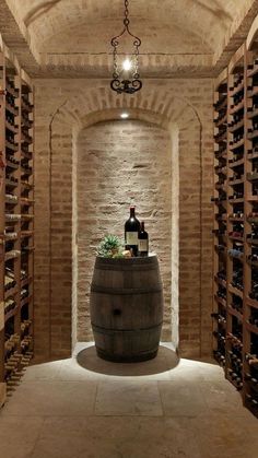 a wine cellar filled with lots of bottles