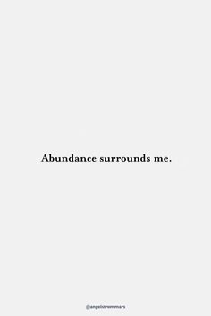 the words abundance surround me in black and white