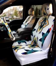 the interior of a car is decorated with native designs