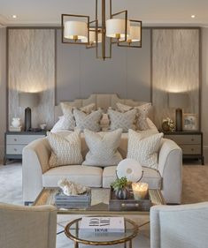 a living room filled with furniture and pillows