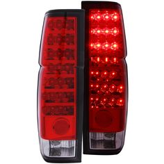 the tail lights of a car are shown in red and clear glass with black trims