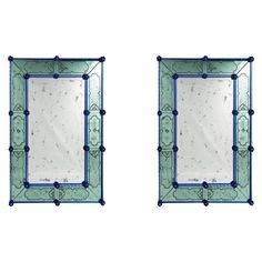 a pair of blue and green mirrors on a white background, with one mirror in the shape of a rectangle