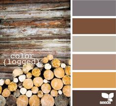 the color palette is brown, white and gray with wood logs in front of it