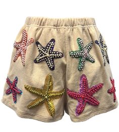 Women's Sea Creature Sequin Patch Bottoms Queen of Sparkles Beige Terry Cloth Starfish Shorts Add some sparkle to your summer wardrobe with our Queen of Sparkles Beige Terry Cloth Starfish Shorts. Made from soft terry cloth, these shorts are both comfortable and stylish. The bedazzled zipper and sequin/pearl starfish designs add a touch of glam to any outfit. Perfect for a day at the beach or a night out. Shop our entire selection of items from brand Queen of Sparkles here. Details Available in Fashion Design Classes, Queen Of Sparkles, Sequin Patch, Baby Hair Clips, Maxi Gown Dress, Sea Creature, Sweater Tank Top, Summer Ready, Romper Pants