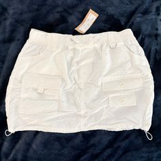 Never Worn White Mini Cargo Skirt With Adjustable Pulls. Size Medium Cargo Skirt, Women's Skirt, Womens Bottoms, Womens Skirt, Mini Skirts, Size Medium, Women Accessories, Skirt, Outfit Accessories