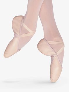 the feet of a ballerina in ballet shoes