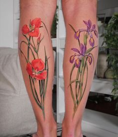 a pair of legs with flowers painted on them