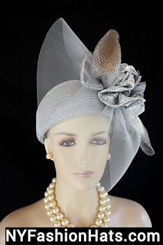 Avant Garde Metallic Silver Wedding Bridal Pillbox Formal Hat. This Elegant Luxury Statement Dress Hat Is Embellished With Ornate Silver Gray Horsehair Crinoline Bowing Mixed In With A Metallic Silver Large Bow. Placed Within This Beautiful Large Bow Is A Handmade Metallic Silver Fabric Bow Enhanced With A Gray Vintage Silk Flower With Stamens. Two Metallic Silver Accents Are Placed Within The Bowing For A Haute Couture Dramatic Fashion Statement. This Is A Stylish Hat And Will Make A Fashion Statement. Classic In Design. Crown Measures 22.5". Standard Sized Fits Most Women Condition Is New Custom Made  This Exquisite Designer Hat Is Part Of The Romance Holiday Line By Konstantdina Anastasia Motf Premium Wedding Bridal Collection. https://nyfashionhats.etsy.com This Formal Metallic Silver Ladies Dress Hats, Formal Hat, Bespoke Hats, Dramatic Fashion, Veiled Hats, Couture Hats, Church Hat, Wedding Fascinators, Couture Bridal