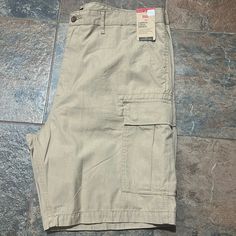 Nwt Levi Strauss Co. Cargo Shorts Khaki Inseam 9.25” Levi's Relaxed Fit Shorts With Pockets, Levi's Relaxed Fit Shorts, Levi's Casual Shorts With Pockets, Casual Levi's Shorts With Pockets, Levi's Short Length Bottoms With Pockets, Levi's Cotton Shorts, Levi's Spring Shorts With Pockets, Levi's Casual Khaki Bottoms, Carhartt Double Knee Pants