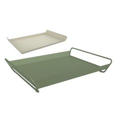 two green trays with handles on each side and an empty tray in the middle