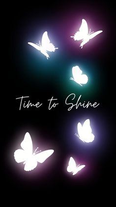 the words time to shine are lit up with white butterflies flying in the dark sky