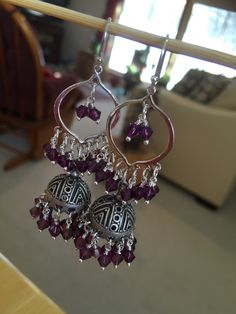 "Oh! my, these are something, unbelievably Pretty, Gorgeous Earrings! I have accented a hoop with AmethystCrystals and in the center a jhumka with moreAmethyst Crystals, these are light and pretty and sensational! These are famous in Jaipur, Rajasthan and all over India. Pair this with any outfit you can dream of, yopu'll love these. My only pair don't miss out on these... Total length is 2\". Metal - Sterling Silver.  Please feel free to ask me for more pictures or questions. Thank You for Shopping Jhumkas they are Ancient, Elegant, Opulent and Regal!" Jaipur Rajasthan, Arabesque, Gorgeous Earrings, Oh My, Jaipur, Alex And Ani Charm Bracelet, Jewelry Art, Jewelry Earrings Dangle, Swarovski Crystals