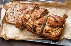 sliced loaf of bread sitting on top of a pan