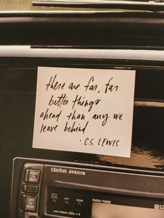 a car radio with a note attached to the front and side of it that says, there are no fars better things ahead than any we leave behind us