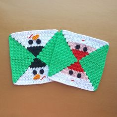 two crocheted coasters with snowmen on them, one is green and the other is red