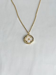 A luxurious lucky clover necklace that's so stunning on and matches everything. An absolute essential in every jewelry collection. Our chains are 100% stainless steel and hypoallergenic so they won't rust, tarnish, or turn your neck green. - Stainless steel chain - Lobster clasp closure - Cubic zirconia gold filled pendant - Select desired size / color at checkout Elegant Stainless Steel Flower Pendant Jewelry, Luxury Stainless Steel Necklaces, Luxury Round Stainless Steel Necklace, Luxury Stainless Steel Round Necklace, Elegant Stainless Steel Flower Pendant Necklace, Luxury Brides, Clover Jewelry, Idea Birthday, Gold Pearl Necklace