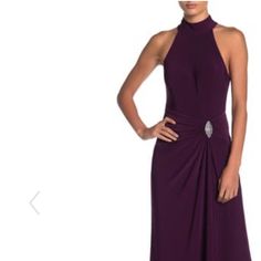 A Hardware Detailed Waist With A Cutout Back Compliments This Sleeveless Long Dress. - Mock Neck - Sleeveless - Buttons At Neck - Cutout Back - Hardware Detail At Waist With Ruching - Jersey Knit Construction - Approx. 60" Length (Size 4) - Imported Purple Sleeveless Maxi Dress For Formal Occasions, Formal Sleeveless Purple Maxi Dress, Sleeveless Purple Cocktail Maxi Dress, Elegant Purple Sleeveless Halter Dress, Purple Fitted Halter Neck Sleeveless Dress, Flirty Purple Halter Neck Dress, Purple Flirty Halter Neck Dress, Purple Stretch Halter Neck Top, Sequin Lace Maxi Dress