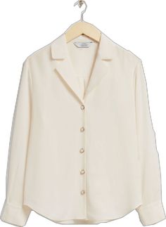 Classic Single Breasted Button-up Top, Formal V-neck Shirt With Button Closure, Classic Single-breasted Button-up Top, White Lapel Collar Blouse For Work, Chic Single Breasted Long Sleeve Blouse, White Blouse With Lapel Collar For Work, Formal V-neck Shirt With Buttons, Elegant Shirt With Lapel Collar And Placket, Spring Tailored Collared Shirt