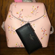 Nwt-Kate Spade-Set-Lizzie-Tossed Blossoms-Pink-Medium Flap Backpack & Leila-Small Slim Bifold Wallet-Pebbled Leather-Black-$488: *Item #1: Nwt-Kate Spade-Lizzie-Tossed Blossoms-Medium Flap Backpack-Pink-$359: Details: 100% Leather Saffiano Pvc Trim Color: Pink Multi Tossed Blossoms Pattern Top Carrying Handle Handle: 3" Drop Adjustable Backpack Straps Front Flap With Magnetic Snap & Drawstring Closure Interior: Front Slip & Back Zip Pocket 2-Way Spade Jacquard Interior Lining Metal Ksny Pin-Moun Elegant Kate Spade Backpack With Zipper Closure, Luxury Kate Spade Standard Backpack, Kate Spade Backpack With Zipper Closure, Casual Kate Spade Backpack For On-the-go, Kate Spade Travel Bag With Floral Print, Kate Spade Floral Print Travel Bag, Pink Floral Print Leather Bag, Kate Spade Pink Bag With Zipper Closure, Kate Spade Backpack