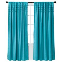 a window with blue curtains on it and the price is $ 299 99 at target com