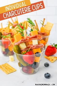 individual charcuterie cups with fruit, crackers and cheese on the side for an easy appetizer