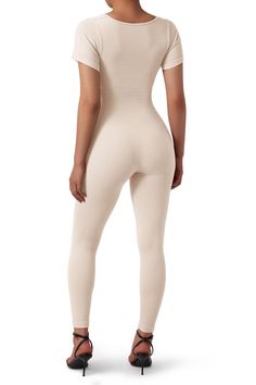 Fabric 90% Nylon, 10% Spandex Feature Stretchy contour fabric & Moisture-wicking Square neckline & Short sleeve Seamless, High waist, Full length This shaping bodysuit is perfect for casual, daily, home, date, shopping, and other occasions. Compressive Seamless Solid Unitard, Compressive Seamless Solid Color Unitard, High Stretch Shapewear Unitard, Compression Shapewear Bodysuit, Stretch Shapewear Unitard, High Stretch Short Sleeve Unitard, Solid Color High Stretch Unitard With Seamless Construction, Solid Fitted Shapewear For Workout, Solid Color Stretch Unitard With Short Sleeves