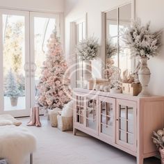 a living room decorated for christmas with pink and white decorations