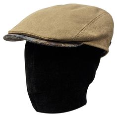 Saint Martin – "Frozen" Water Repellent Canvas Flat Cap Don't trade style for comfort in the cold and rain. Both fashionable and functional, this Saint Martin flat cap is made of water repellent cotton canvas to protect your head no matter the weather. The cap's warm olive-tinted khaki outer is complimented by a blue plaid bill. Its interior is lined with soft, breathable cotton and a paisley-patterned cotton sweatband to ensure maximum comfort. The burnished gold Saint Martin logo plays off of the cap's warm hues and rugged material to add an air of luxury to this practical and wearable cap. Made in Italy from the highest quality materials, the "Frozen"cap is as well constructed as they come. Water will bead right off this hat to keep its wearer comfortable and dry. Perfect for any weathe Winter Outdoor Flat Cap Baseball Cap, Winter Outdoor Flat Cap, Winter Outdoor Six-panel Hat, Winter Six-panel Cotton Baseball Cap, Winter Cotton Six-panel Baseball Cap, Winter Six-panel Cotton Hat, Winter Cotton Six-panel Hat, Cotton Winter Hat For Outdoor Activities, Functional Flat Cap For Outdoor