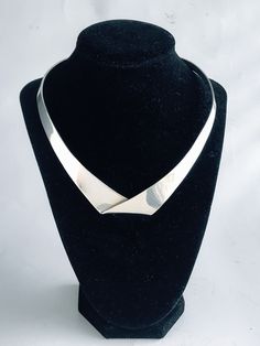 "Vintage Taxco Mexico 925 Silver Modernist Folded Design Choker. Brutalist inspired design. Thick heavy 67 gram sterling silver material, Does have some flex therefore neck opening can adjusted for various neck sizes. Lightly cleaned ready to wear. Markings: TD-27, Mexico, 925 Measurements: Approx 16\" inside circumference including neck opening, Inside diameter across at widest point 5 1/4, Neck opening 3 1/8\". Total Weight: 67 grams Condition: Good Vintage condition, ready to wear with minima Brutalist Jewelry, Geometric Bangle, Sterling Silver Choker, Choker Collar Necklace, Necklace Chunky, Silver Choker, Sterling Silver Cuff Bracelet, Choker Collar, Choker Necklaces