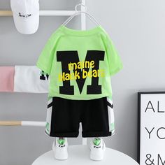 Toddler Boy Letter Print T-shirt & Shorts - PrettyKid Family Matching Sets With Cartoon Print Short Sleeves, Family Matching Sets With Letter Print For Playwear, Short Sleeve Sets With Letter Print For Playtime, Family Matching Sets With Letter Print For Play, Playful Summer Sets With Letter Print, Green Cartoon Print Summer Sets, Playful Letter Print Playwear Sets, Summer Letter Print Sets For Playtime, Summer Playful Letter Print Sets