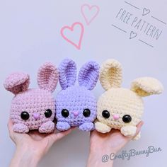 three small crocheted rabbits are held up in front of a white background with the words free pattern on it