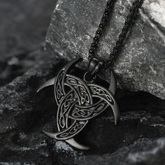 The Triple Horns of Odin Necklace: Also named as The Horn Triskelion, the drinking vessels that are traditional to Norse toasting rituals and connected to mythological stories of Odin. Used as a symbol of Wisdom and Inspiration, poetic inspiration in particular.  Made of high-grade 316L stainless steel, this Odin necklace is hypoallergenic and comfortably fits your skin.   SPU:TP12686  Collection:Viking  Materials: Stainless Steel  Pendant Size: 1.77 inches * 1.73 inches;   Chains Length: 22 inc Viking Style Metal Necklace For Gift, Viking Jewelry Mens Necklace, Viking Style Stainless Steel Silver Necklaces, Silver Viking Stainless Steel Necklaces, Viking Pendant Necklace Collectible, Celtic Knot Necklace, Nordic Vikings, Viking Symbols, Viking Necklace