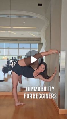 a woman doing a yoga pose in front of a mirror with the words hip mobility for beginners