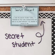 a note pinned to a bulletin board that says secret student