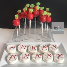 cake pops with letters and arrows on them