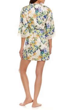 Silky-soft satin refines the flowy silhouette of these floral pajamas pairing a lace-trimmed camisole with coordinating shorts and a matching robe. 18" top center front length; 1 1/2" inseam; 26" leg opening; 11 1/2" front rise; 13" back rise; 35" robe length (size Medium) Includes two-piece short pajamas and short robe Top has V-neck; adjustable straps Bottoms have elastic waist Robe has three-quarter sleeves; removable tie belt 100% polyester Hand wash, dry flat Imported Silk Floral Print Sleepwear For Spring, Silk Sleepwear With Floral Print For Spring, Summer Silk Sleepwear With Lace Trim, Silk Summer Sleepwear With Lace Trim, Silk Summer Sleepwear For Home, Elegant Lace Trim Sleepwear For Vacation, Summer Floral Print Beige Sleepwear, Cream Satin Sleepwear For Summer, Beige Floral Print Sleepwear For Summer