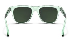 Fit, feel, and finish — ‘Sage Coast’ has it all. These green sunglasses adopt a monochrome color scheme in our lightweight, supremely comfortable ‘Sender’ style, enabling an effortless match with any ensemble. The PureBlend™ Lens — featuring superior clarity and durability — lies flush with the frame for a sleek, sophisticated look sure to stir envy. // Details: Gender: Unisex Frame: Gloss Crystal Green Lens Color: PureBlend™ Green UV Rating: 100% UV Protection Fit / Size: Medium - Large Vibe: L Blenders Eyewear, Green Lens, Crystal Green, Green Sunglasses, Monochrome Color, Green Crystals, Sticker Pack, Personal Marketing, Color Scheme