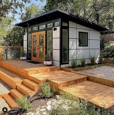 a small house with steps leading up to it