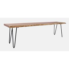 a wooden table with black hairpin legs and a wood slab on the top,