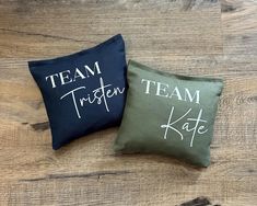 two pillows that say team, thirteen and kate