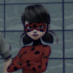 a woman in a red and black outfit with her face painted like a ladybug