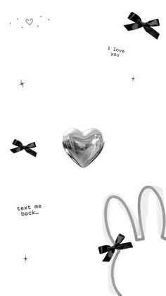 a white background with black bows and a silver heart