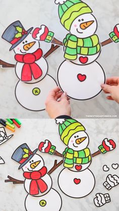 someone is making snowmen out of paper with markers and crayons on the table