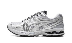 The ASICS Gel-Kayano Legacy “Pure Silver” is a version of the retro-inspired running sneaker in the popular silver Y2K style.  The ASICS GEL-Kayano Legacy is a hybrid silhouette that combines elements of many past GEL-Kayano models from the past 30 years, including using the ultra popular GEL-Kayano 14 as the base of the shoe.  As for the “Pure Silver” colorway, it features a grey mesh base with silver synthetic overlays.  A black mesh tongue contrasts the sneaker’s mostly grey and silver appearance. Silver Y2k, Asics Gel Kayano, Gel Kayano, Silver Sneakers, Balenciaga Triple S, Silver Shoes, Custom Watch, Summer Beach Wear, Pretty Shoes