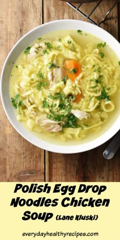 a bowl of chicken noodle soup on a wooden table with the title polish egg drop noodles chicken soup